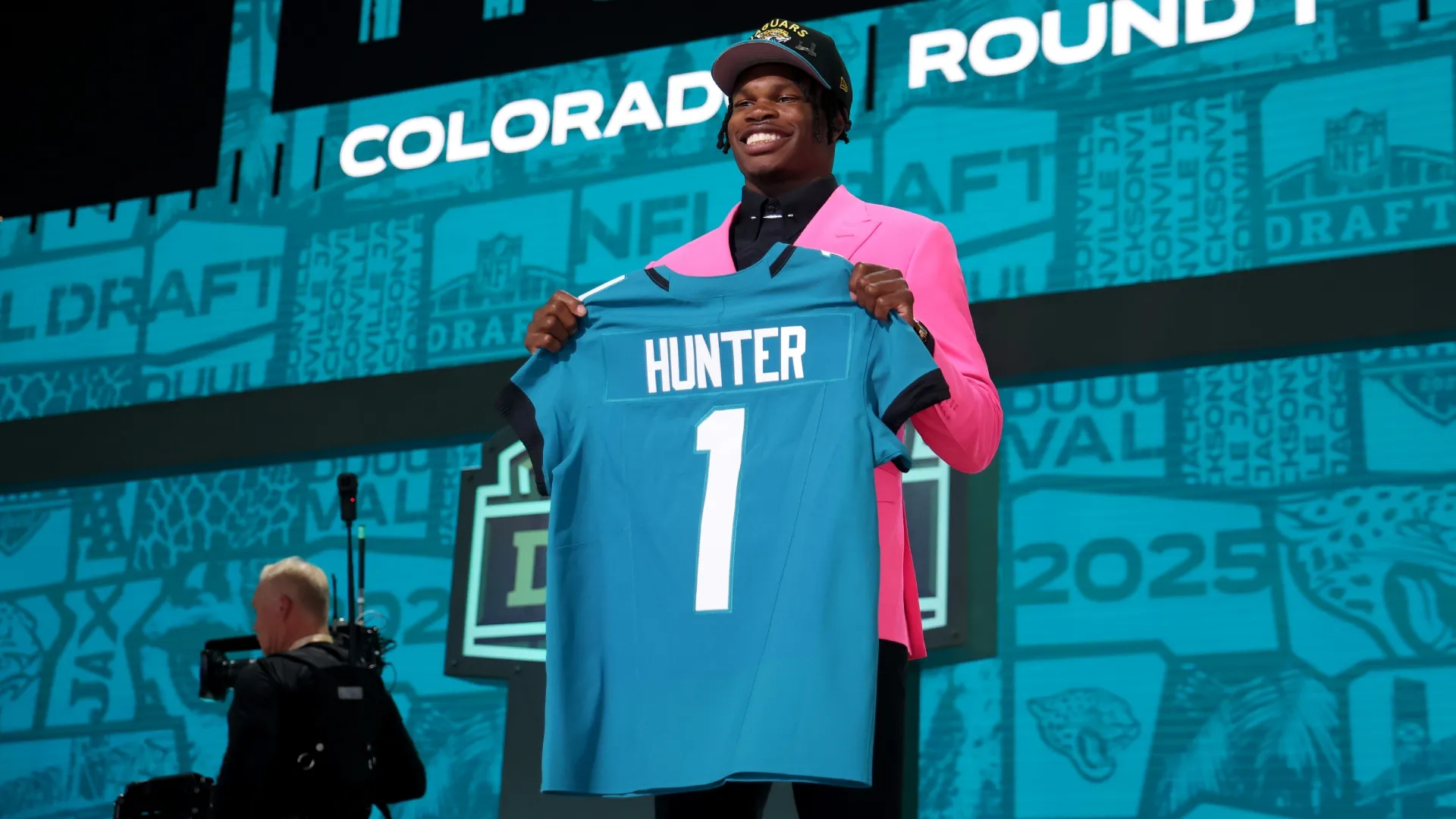 Travis Hunter during the first round of the 2025 NFL Draft (Source: Stacy Revere/Getty Images)