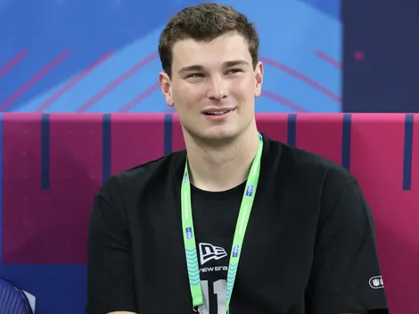 Why is Fernando Mendoza not attending the 2026 NFL Draft today?