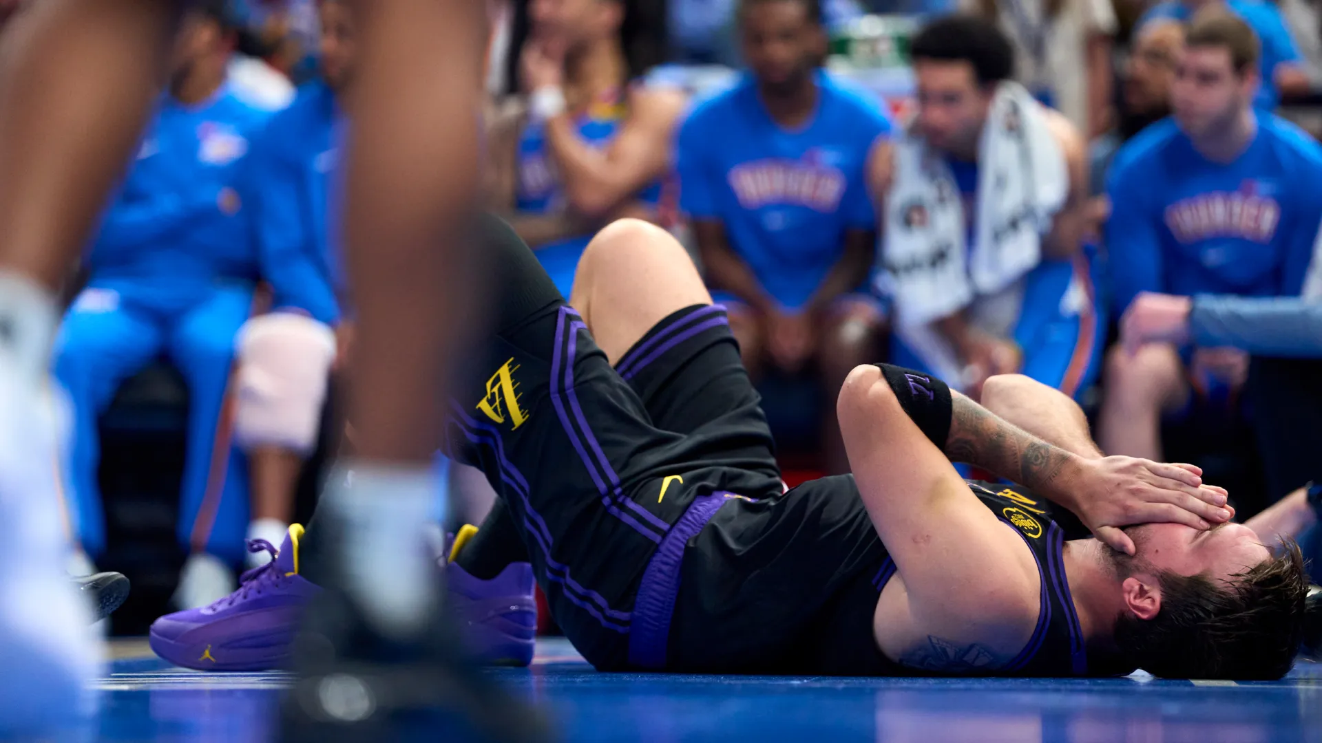 Luka Doncic reacts after getting injured. (Getty Images)