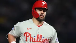 Kyle Schwarber #12 of the Phillies rounds the bases after hitting a home run.