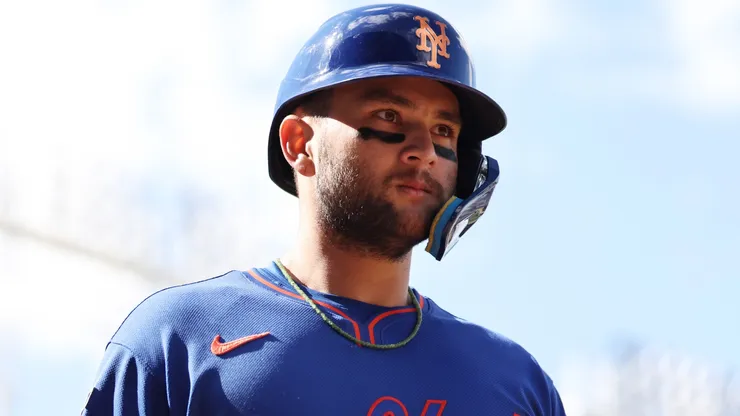 Bo Bichette #19 of the New York Mets looks on after scoring.