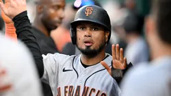Luis Arraez #1 of the San Francisco Giants celebrates with teammates.