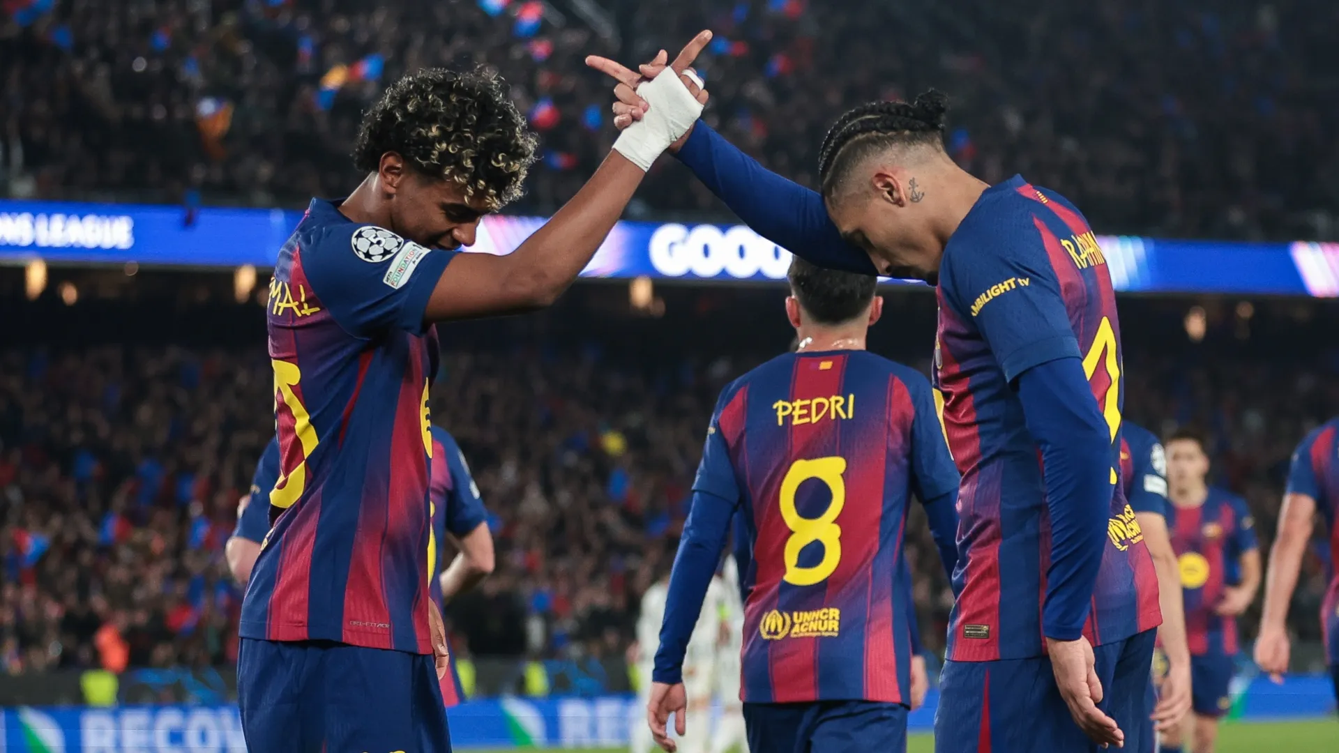 Raphinha celebrates with Lamine Yamal after scoring the team’s seventh goal during the UEFA Champions League (Source: Eric Alonso/Getty Images)