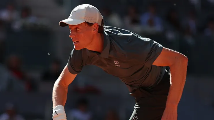 Jannik Sinner of Italy serves.