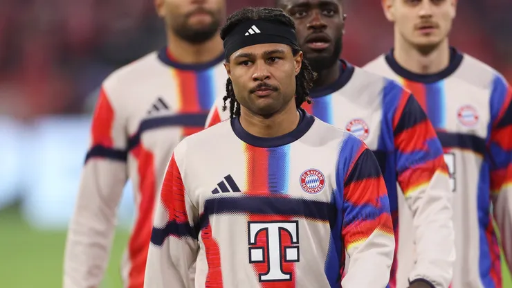 Serge Gnabry warms up prior to the UEFA Champions League 2025/26 Quarter-Final Second Leg match.