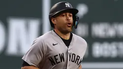 Giancarlo Stanton #27 of the New York Yankees rounds the bases.