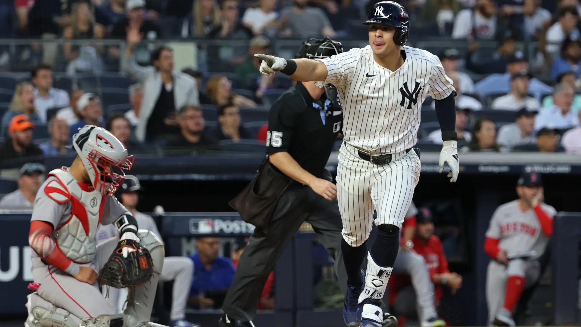 Anthony Volpe #11 of the Yankees reacts after hitting a solo home run. Al Bello/Getty Images