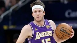 Austin Reaves #15 of the Los Angeles Lakers dribbles the ball.