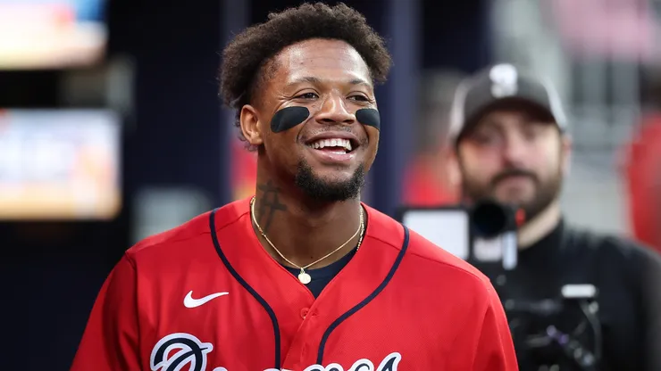 Ronald Acuña Jr. #13 of the Braves reacts after hitting a two-run homer.