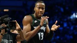 Ayo Dosunmu #13 of the Minnesota Timberwolves celebrates against the Denver Nuggets.