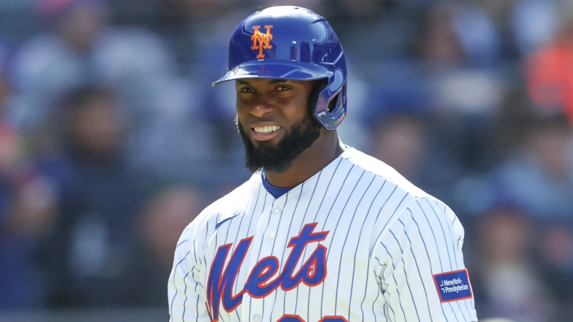 Luis Robert Jr looks on