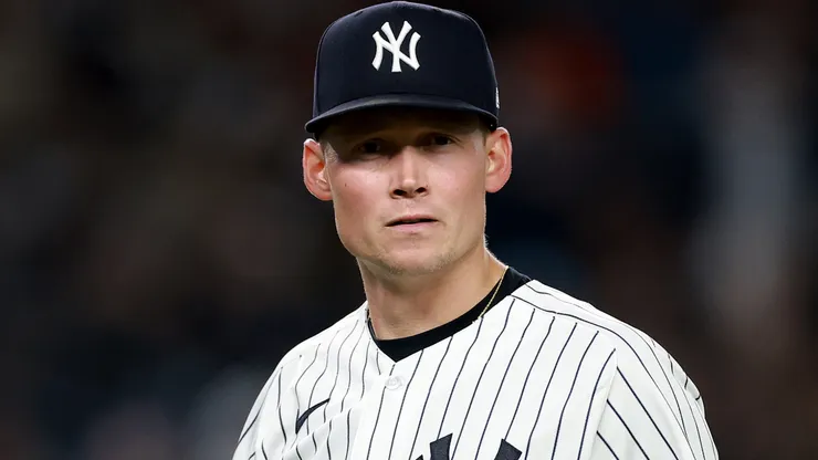 Will Warren #29 of the New York Yankees heads to the dugout.
