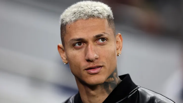 Richarlison of Tottenham Hotspur looks on.