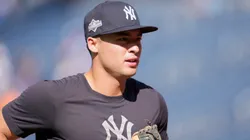 Anthony Volpe #11 of the New York Yankees warms up.