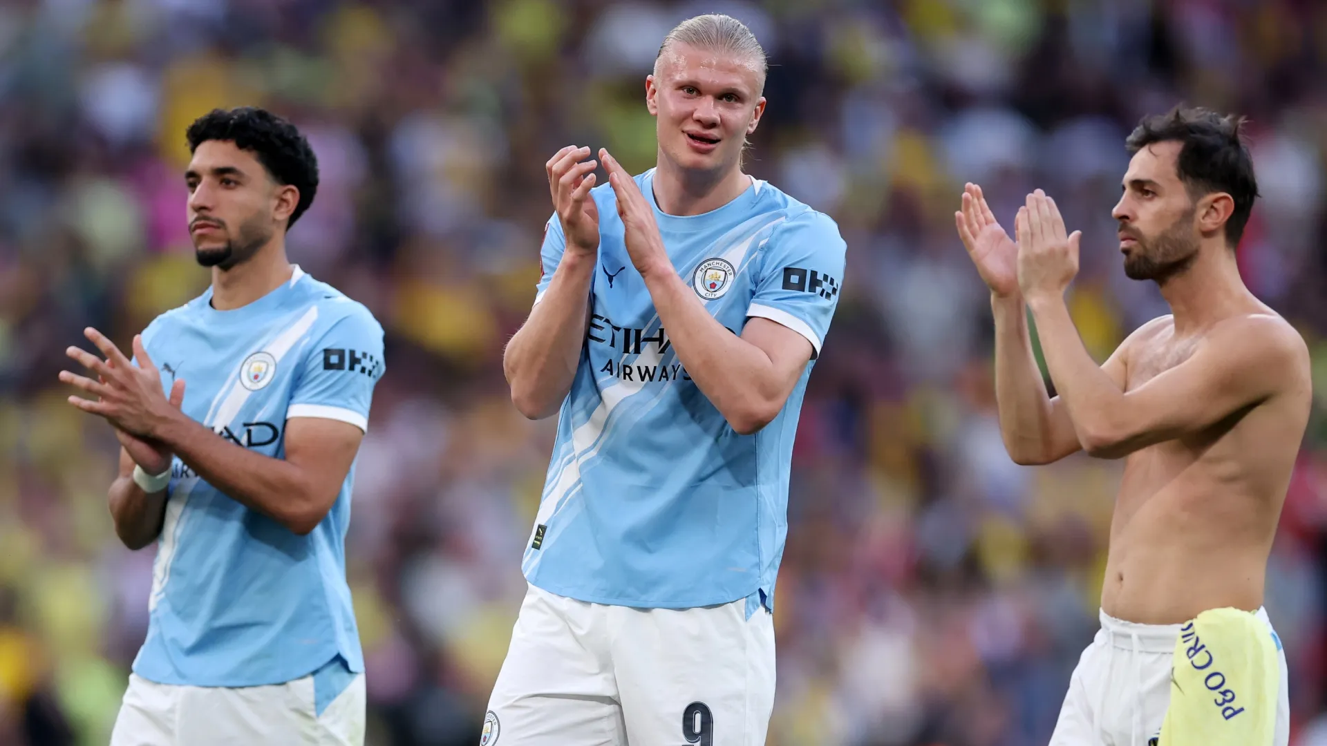 Omar Marmoush, Erling Haaland and Bernardo Silva applaud the fans (Source: Justin Setterfield/Getty Images)