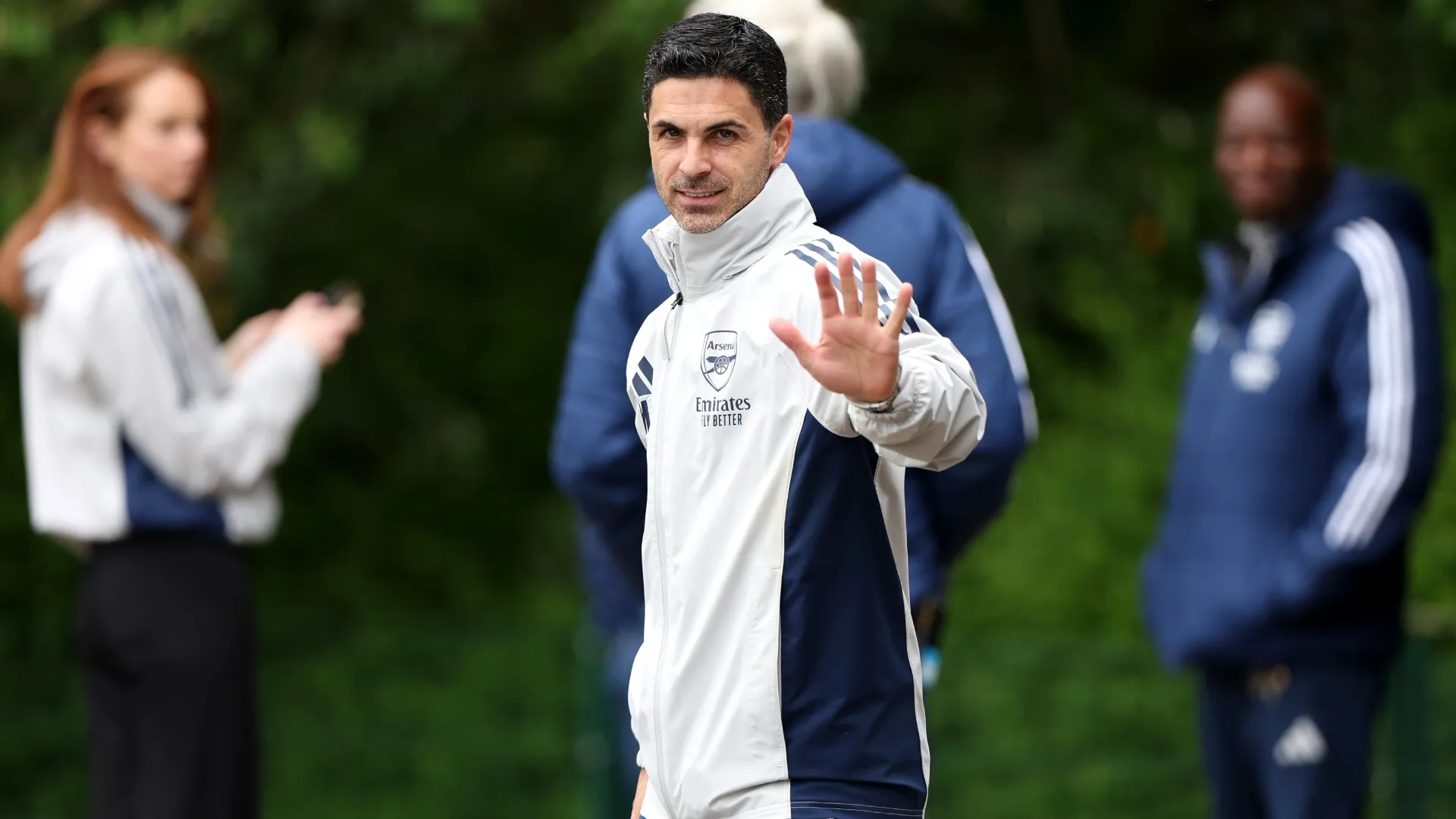 Mikel Arteta waves to the media during the training session before the second leg. (Source: Harry Murphy/Getty Images)