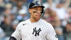 Aaron Judge #99 of the Yankees scores a run.