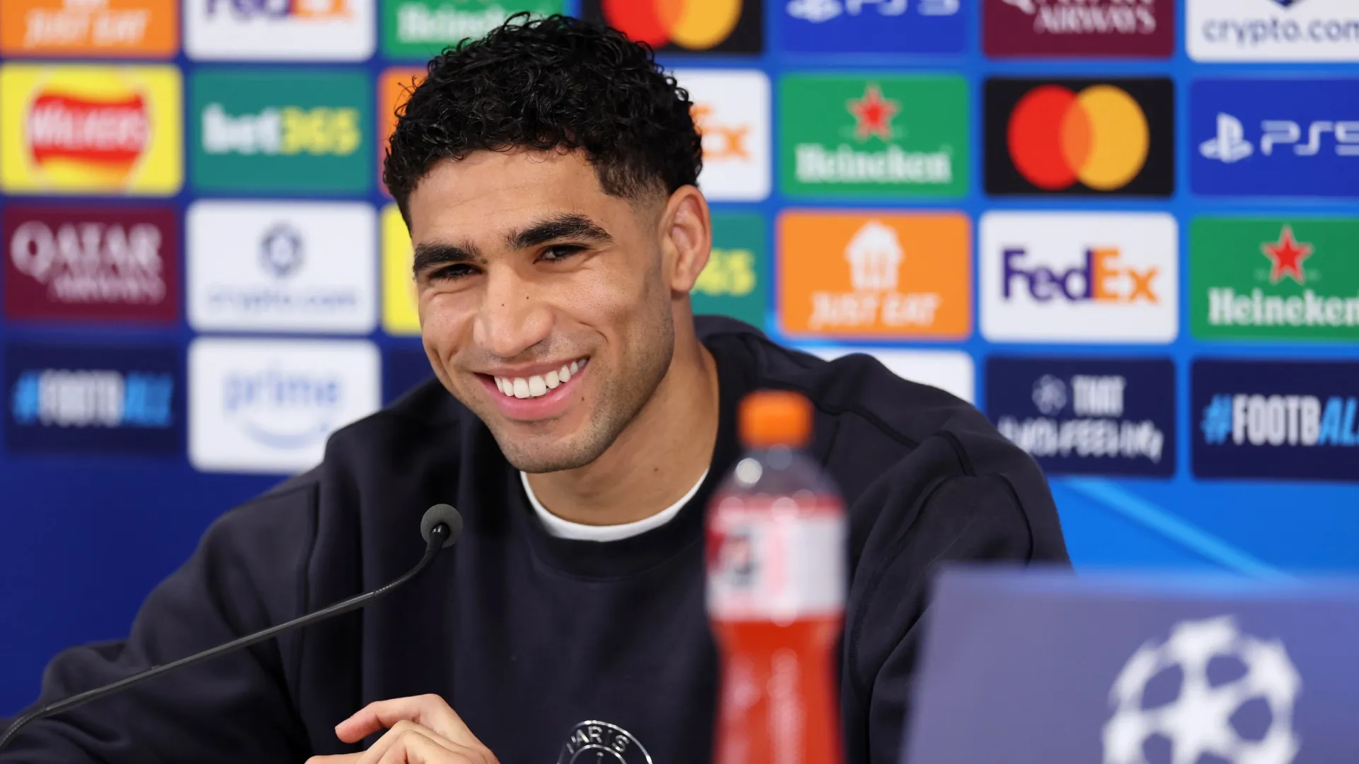 Achraf Hakimi speaks to the media during a Paris Saint-Germain Press Conference (Source: Jan Kruger/Getty Images)