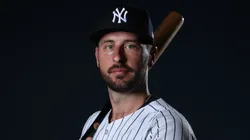 Paul DeJong #18 with the Yankees poses for a photo.