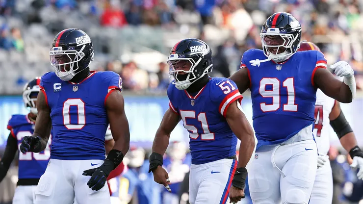 New York Giants defense celebrates after making a play.