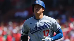 Shohei Ohtani #17 of the Los Angeles Dodgers returns to the dugout.