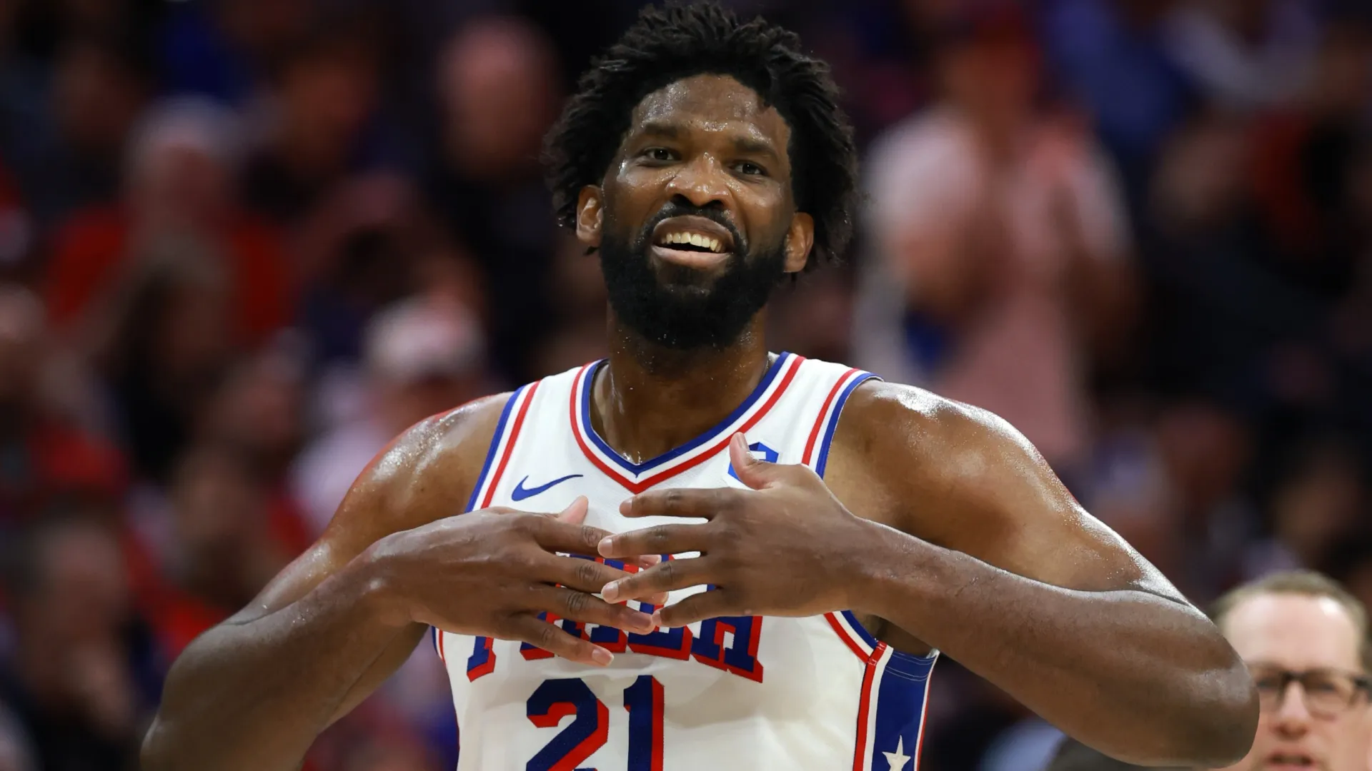 Joel Embiid reacts during the first quarter of a game against the Boston Celtics (Source: Elsa/Getty Images)