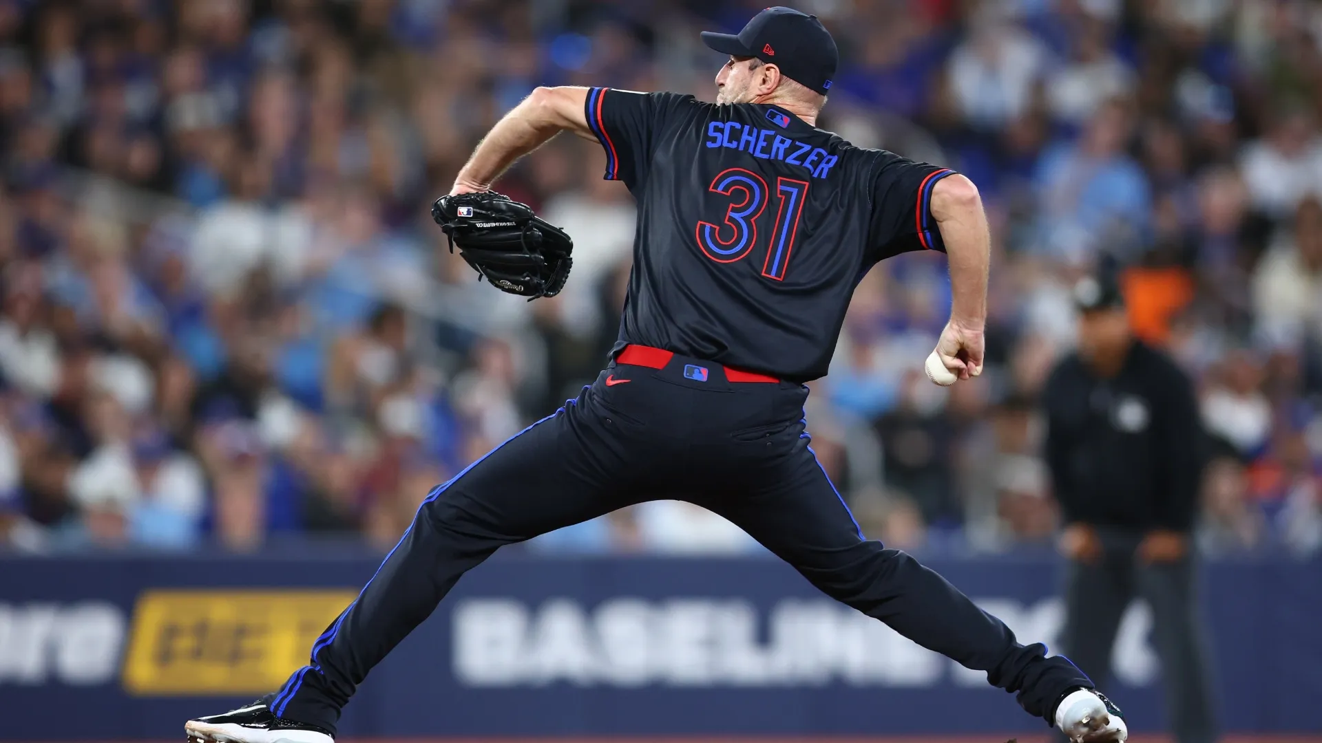 Max Scherzer #31 of the Blue Jays pitches in the first inning against the Guardians. Vaughn Ridley/Getty Images