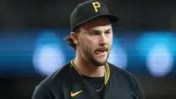Paul Skenes #30 of the Pittsburgh Pirates reacts after pitching out of the eighth inning.