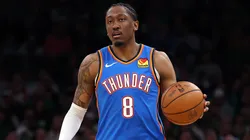Jalen Williams #8 of the Oklahoma City Thunder dribbles against the Boston Celtics