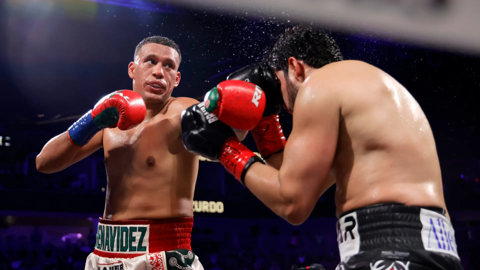 David Benavidez punches WBA/WBO cruiserweight champion Gilberto Ramirez.  Steve Marcus/Getty Images