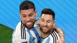 Nicolas Otamendi and Lionel Messi celebrate a goal for Argentina.