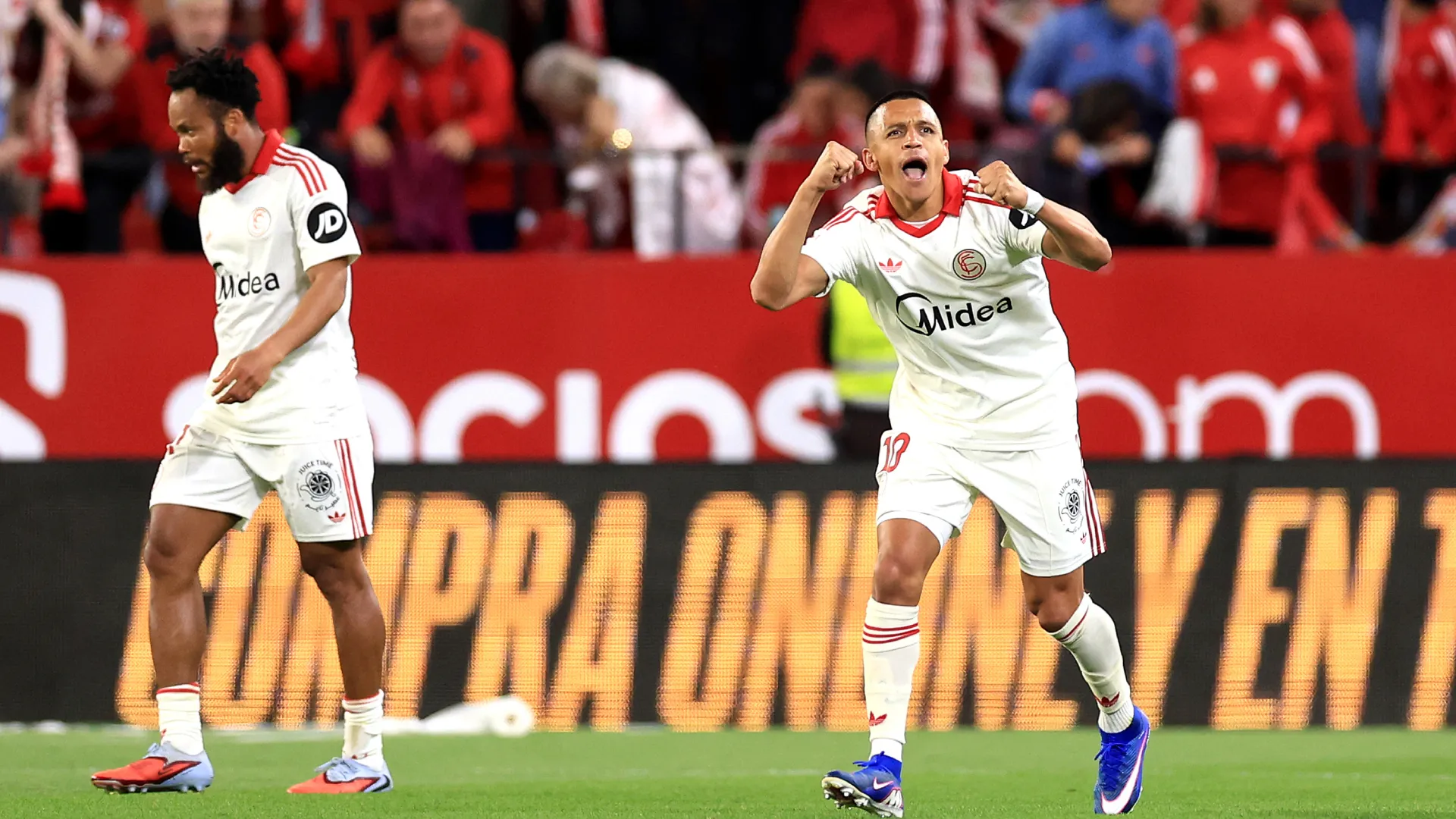 Alexis Sanchez celebrates a goal for Sevilla. (Getty Images)