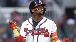 Ronald Acuña Jr. #13 of the Atlanta Braves reacts after striking out.