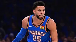 Ajay Mitchell #25 of the Oklahoma City Thunder handles the ball.