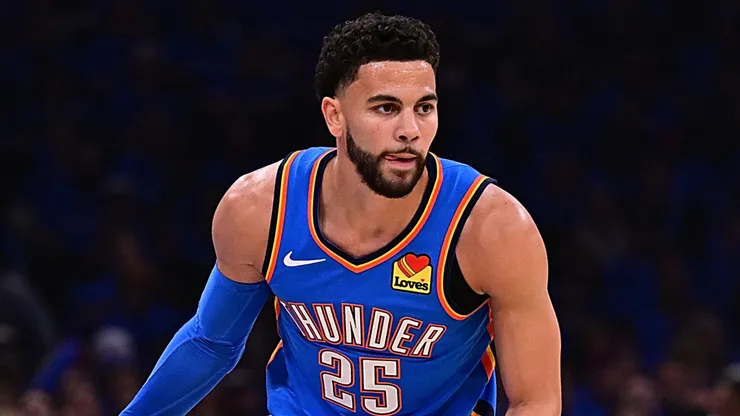 Ajay Mitchell #25 of the Oklahoma City Thunder handles the ball.
