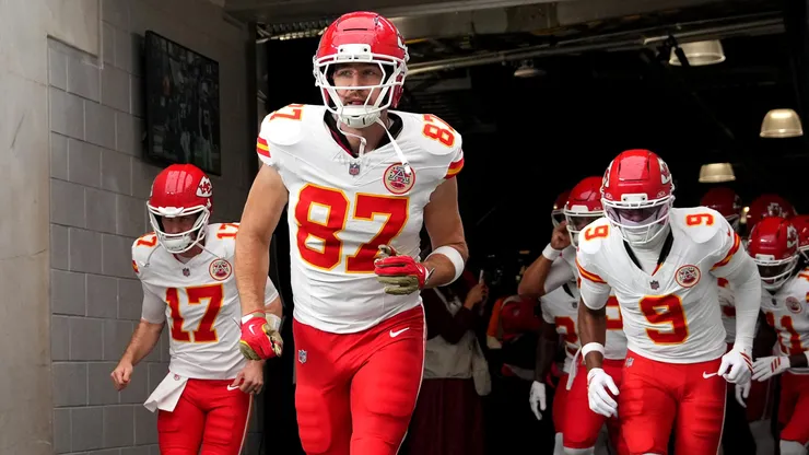 Travis Kelce #87 of the Kansas City Chiefs runs onto the field prior to the game against the Las Vegas Raiders