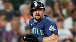 Cal Raleigh #29 of the Mariners scores in the seventh inning.