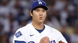 Shohei Ohtani #17 of the Dodgers reacts after a pitch during the third inning.