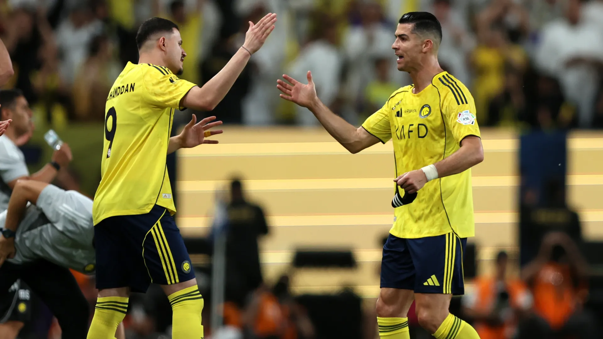 Cristiano Ronaldo is replaced by Abdullah Al Hamdan. (Getty Images)