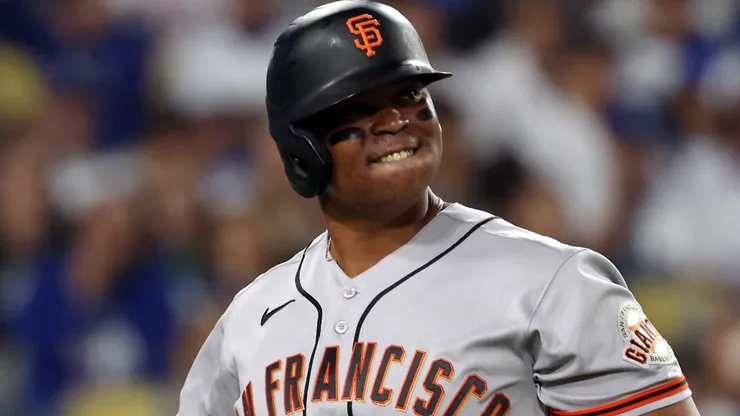 Rafael Devers #16 of the Giants reacts after striking out.
