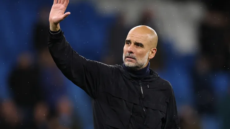 Man City manager Pep Guardiola waves to the crowd after the Premier League match