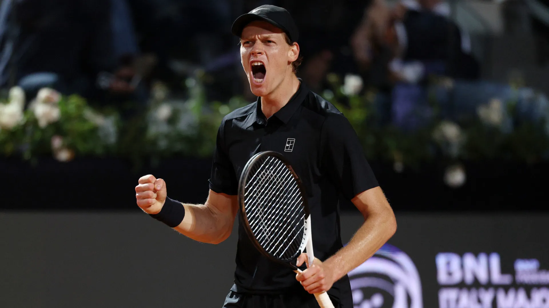 Jannik Sinner celebrates after winning a point. (Getty Images)