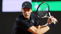 Jannik Sinner of Italy plays a backhand against Daniil Medvedev.