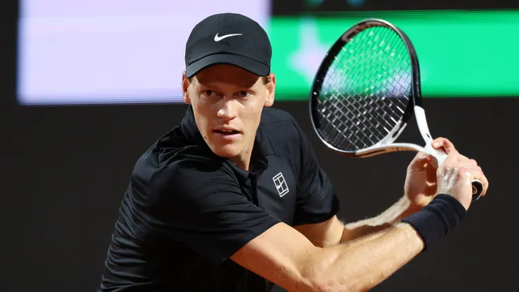 Jannik Sinner of Italy plays a backhand against Daniil Medvedev.