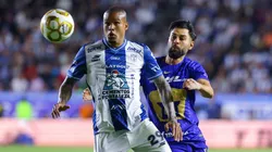Robert Kenedy of Pachuca fights for the ball with Ruben Duarte of Pumas