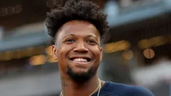Ronald Acuña Jr. looks on.