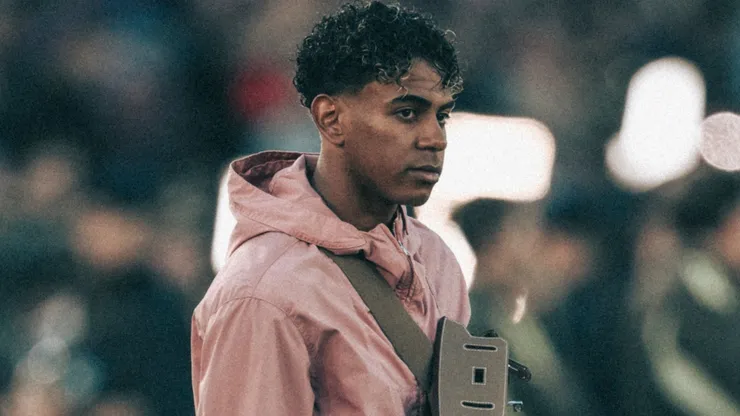 Lamine Yamal of FC Barcelona looks on.