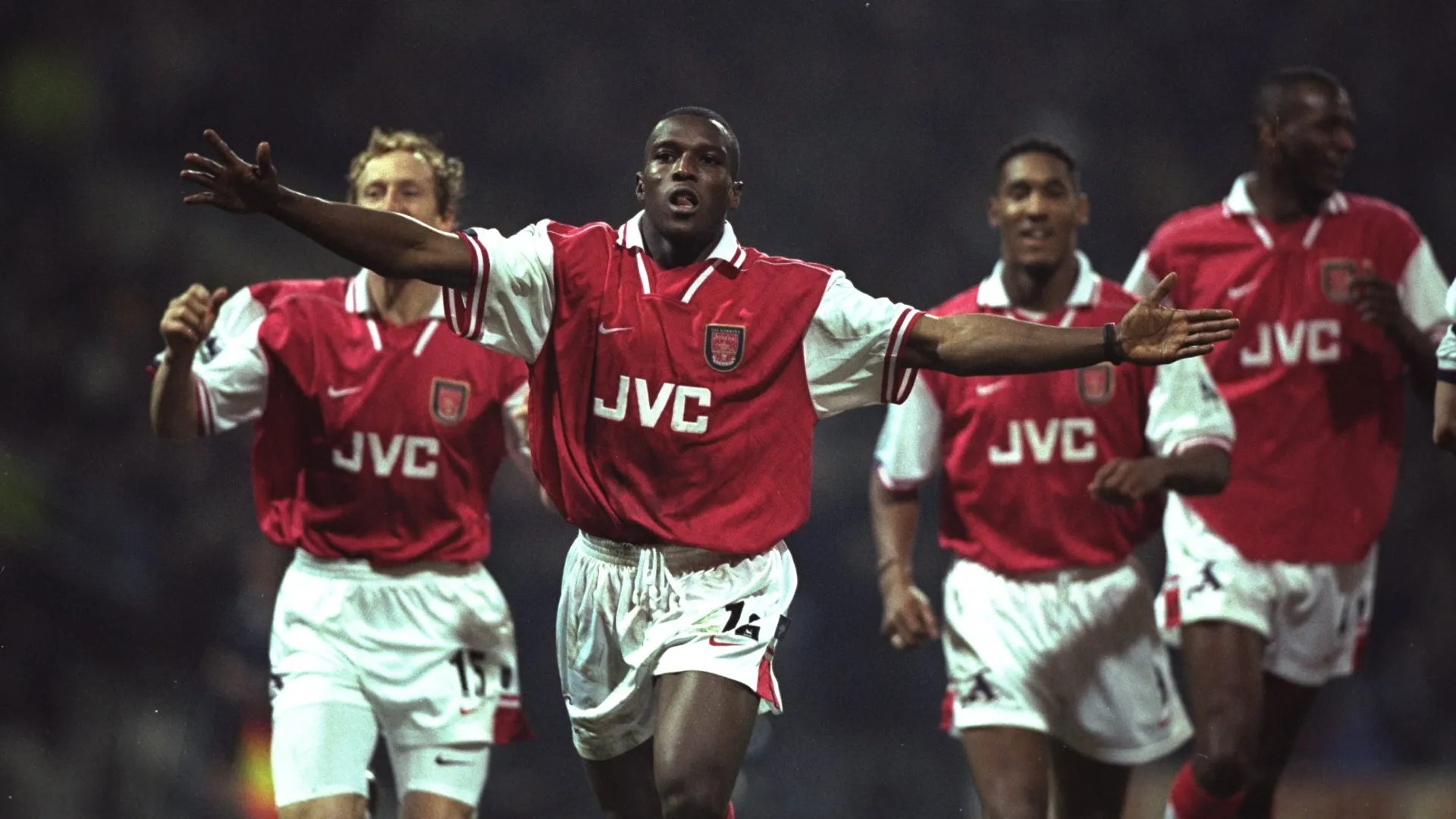 Arsenal striker Christopher Wreh celebrates scoring the winning goal in 1998 (Source: Ross Kinnaird /Allsport)