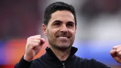 Mikel Arteta, Manager of Arsenal, acknowledges the fans.