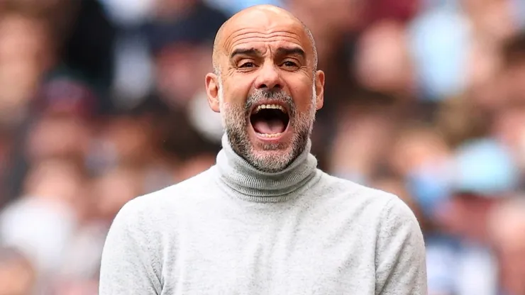 Pep Guardiola, Manager of Manchester City, reacts.
